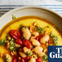 Rukmini Iyer’s quick and easy recipe for cheesy polenta with tomatoes, butter beans and pesto | Quick and easy