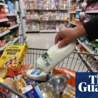 UK supermarkets urged to consider voluntary price caps on essential foods